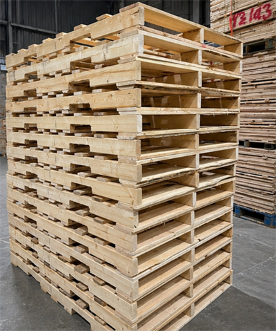 Stack of standard and custom wooden pallets